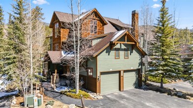 View of property exterior featuring an attached ga