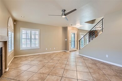 Foyer entrance with light tile patterned floors, c