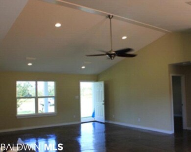 Large open great room with recessed lighting and v