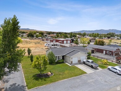 Aerial perspective of suburban area with a mountain backdrop