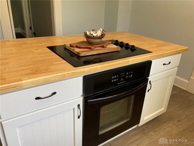 Island has cook top and wall oven