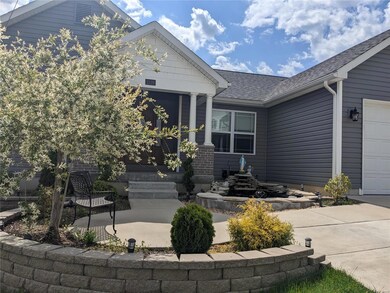 Covered Front Porch with Koi Pond