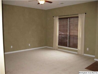 Another view of the living room showing the faux w