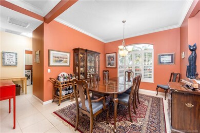 Dining area is open to the entry and sitting area.
