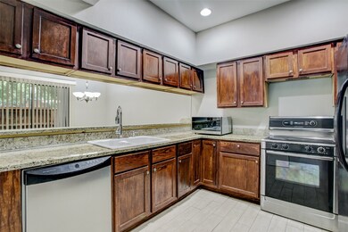 Spacious kitchen with an overhang breakfast bar of