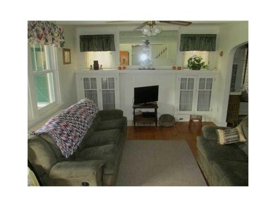 Living Room. Living room has hardwood floors and b