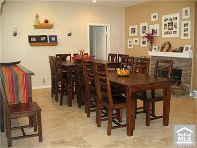 FAMILY RM W/FIREPLACE UTILIZED AS FORMAL DINING