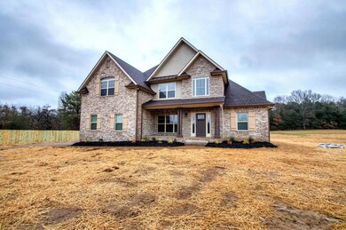 Charming all brick classic home features a large yard on 1.5 acres!