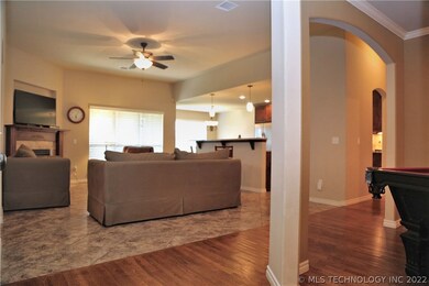Wood floors from entry through dining room & hallw