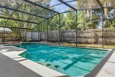 Massive screened-in pool and a fully fenced backya