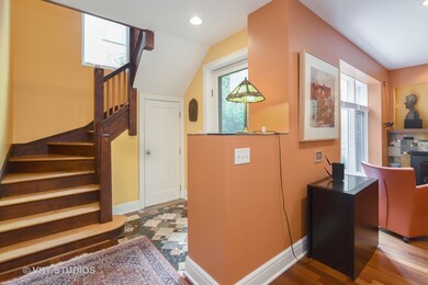 Foyer and stairs with original treads, risers, ban