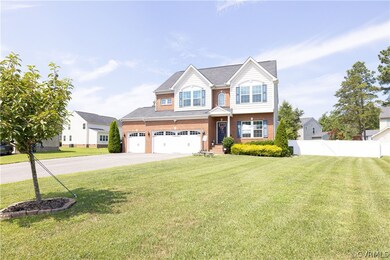 Note the vinyl privacy fence that was installed in