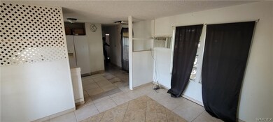 View of the living area upon entry