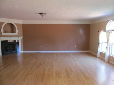 Family Room. Sunlit with gleaming bamboo floors.
