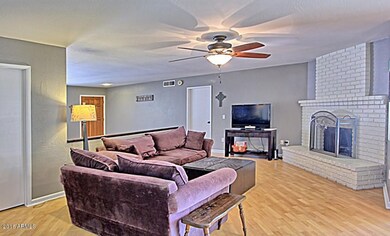 Living Area w/ wood burning fireplace