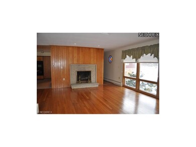 Gleaming Refinished Hardwood Flooring & Fresh Pain