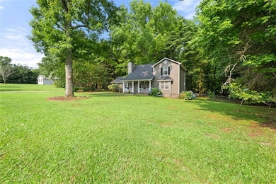 View of yard with a porch