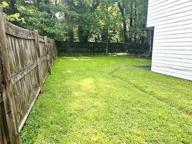 View of fenced backyard