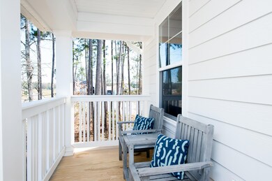 PEMBROOKE EXTERIOR 2ND STORY FRONT PORCH