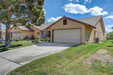 Single story home with a tile roof, central AC, st