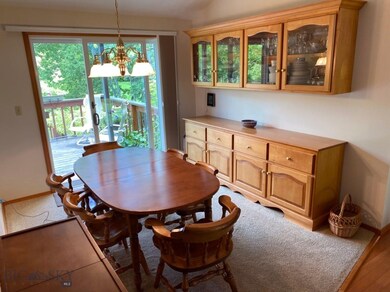 Upstairs dining room with access to back deck.  (B