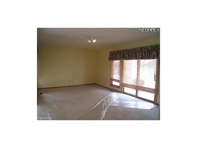 Huge family room with access to covered patio.