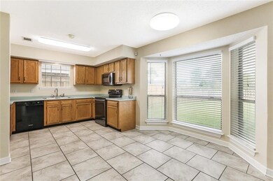 Kitchen with a walk in pantry and beautiful bay wi