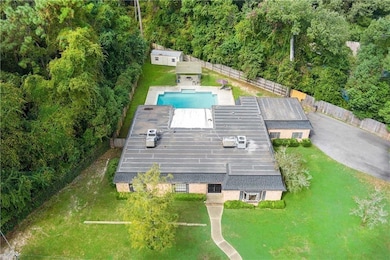 View from above of property featuring a pool area