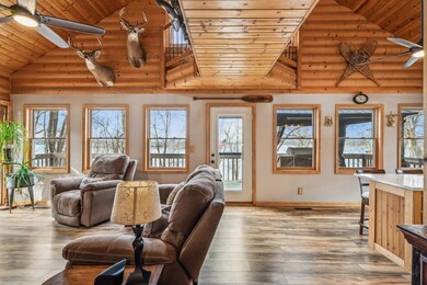 Open concept living room with Lakeview windows