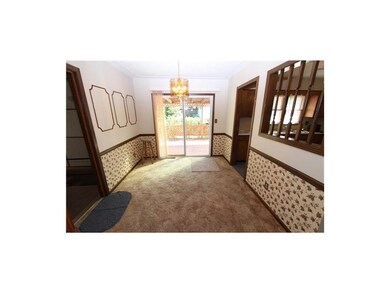 Dining Area measures 10'x9' and opens to the Deck,