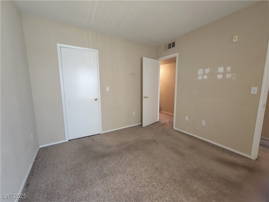 Unfurnished bedroom featuring carpet