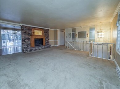 This bright room features large windows, crown mol