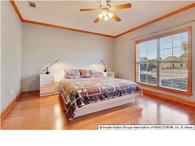 Master Bedroom with wood floors