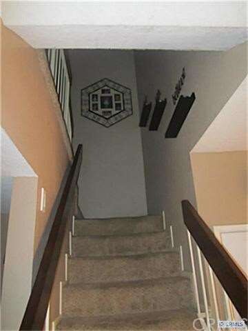 STAIRWAY TO LARGE BEDROOMS