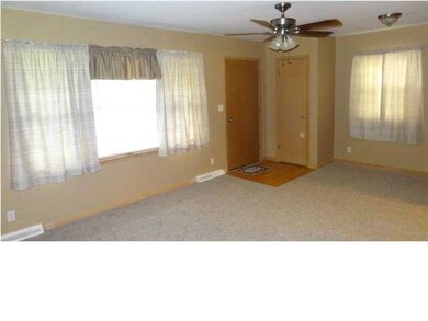 The house has been freshly painted and new carpet 