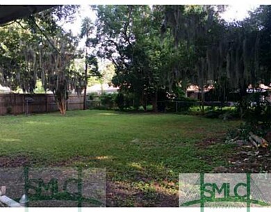 Land/Lot. Large fenced back yard.