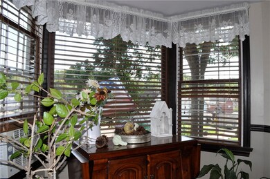Bay windows in living and dining rooms