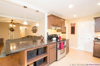 Kitchen Island is Open to Living with Breakfast Ba