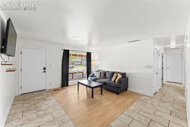 Living room with light wood finished floors