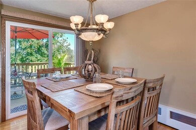 Sliding glass doors transitions the dining room to