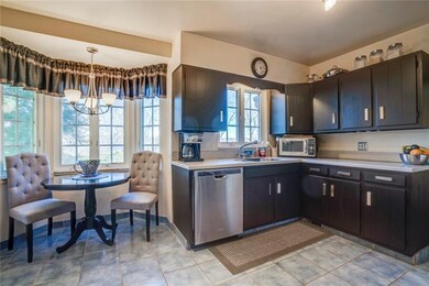 Breakfast nook off of kitchen overlooking the back
