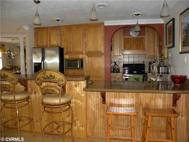 Kitchen - Custom Kitchen with corian counters & st