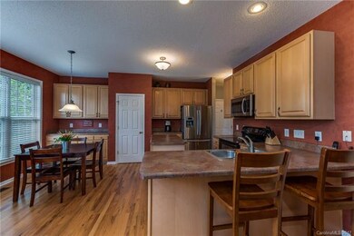 Large open kitchen with eat in area