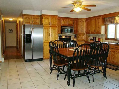 Kitchen. View #2 showing hall to...