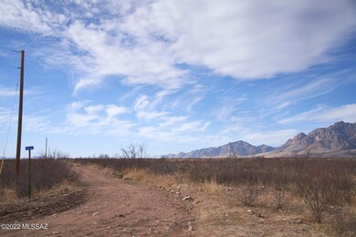 NE corner, road fronting property