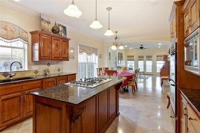 Large Kitchen Opens onto Large Breakfast Area and