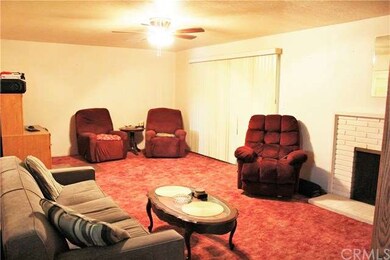 Large Living Area with Enclosed Patio through slid