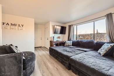 Living area featuring light wood-style flooring