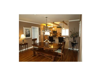 Breakfast room overlooking bar area and kitchen.