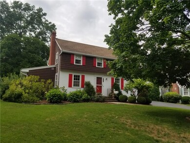 Professionally landscaped and mature trees at 209 